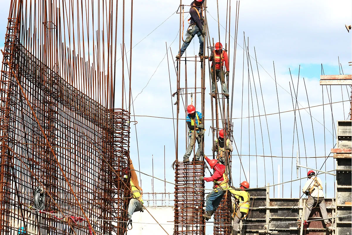 Photograph of a team constructing a building